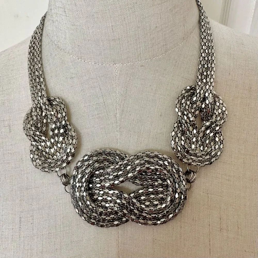 Silver tone knotted multi chain statement necklace